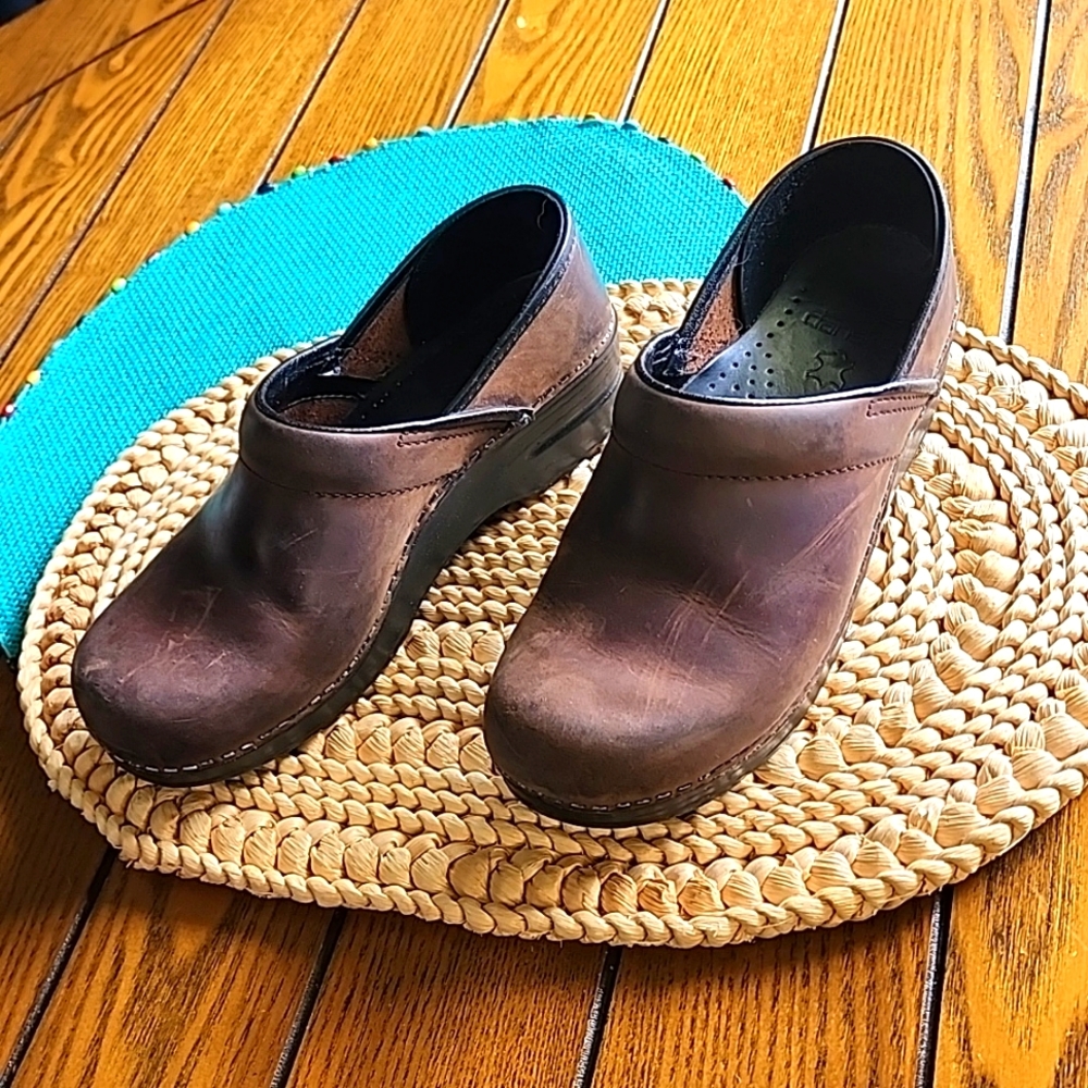 Dansko brown leather clogs